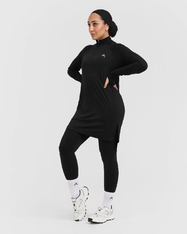 Go To Seamless Loose Long Sleeve Longline Top | Black